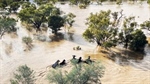 Record-breaking heat and rain, as the flood rescue just got wet again