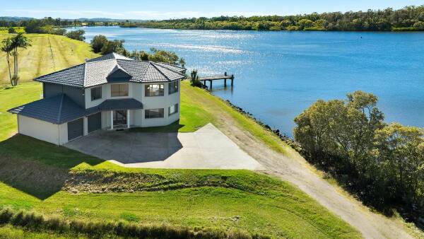 Luxury living on riverfront property with private jetty, airstrip | Photos