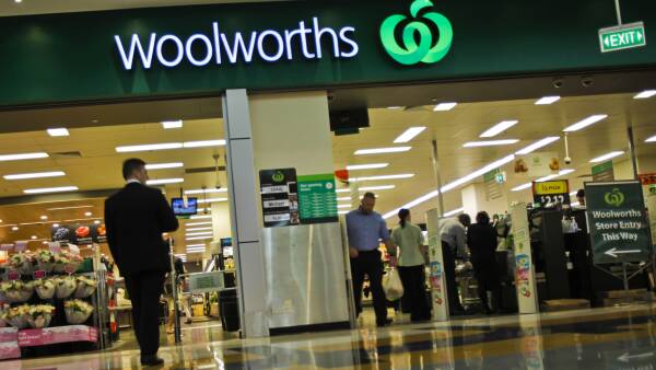 Woolies boss backs beef as activists go on land clearing rampage at AGM